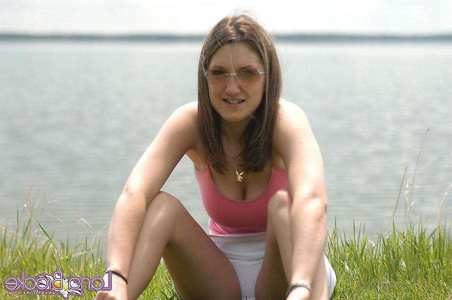 20P Pictures of teen chick Lana Brooke flashing her tits outside