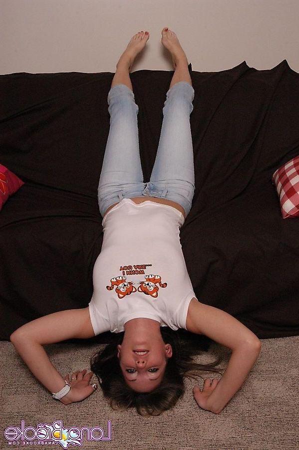20P Pictures of Lana Brooke showing her titties on the couch