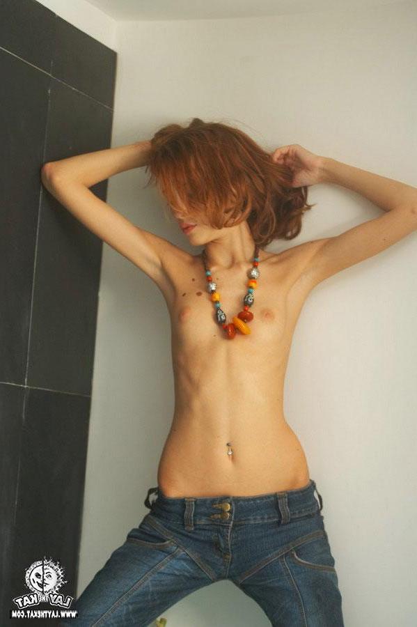 15P Pictures of teen Lay The Kat showing off her small tits