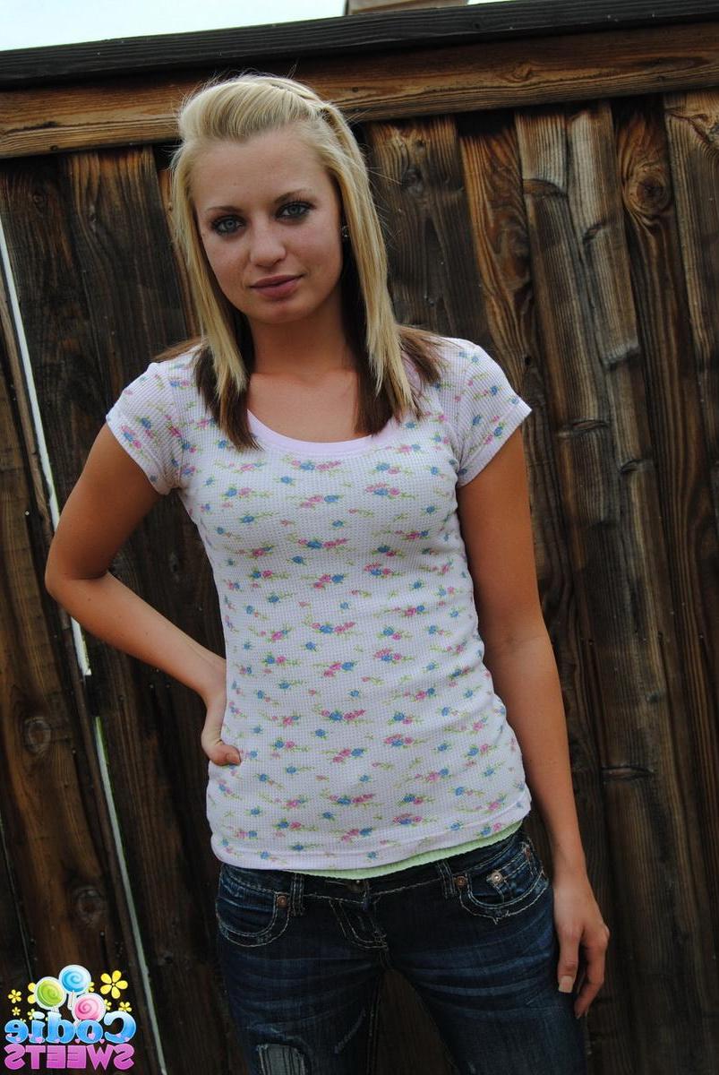 12P Perky blonde tease Codie Sweets flashes her tits as she strips naked outside