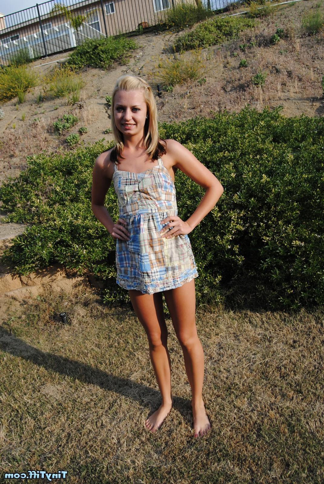 16P Tiff is outdoors removing her summer dress