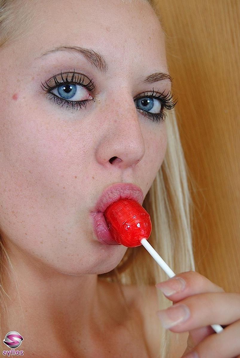 15P Pictures of Kaylee sucking a lollipop in her socks