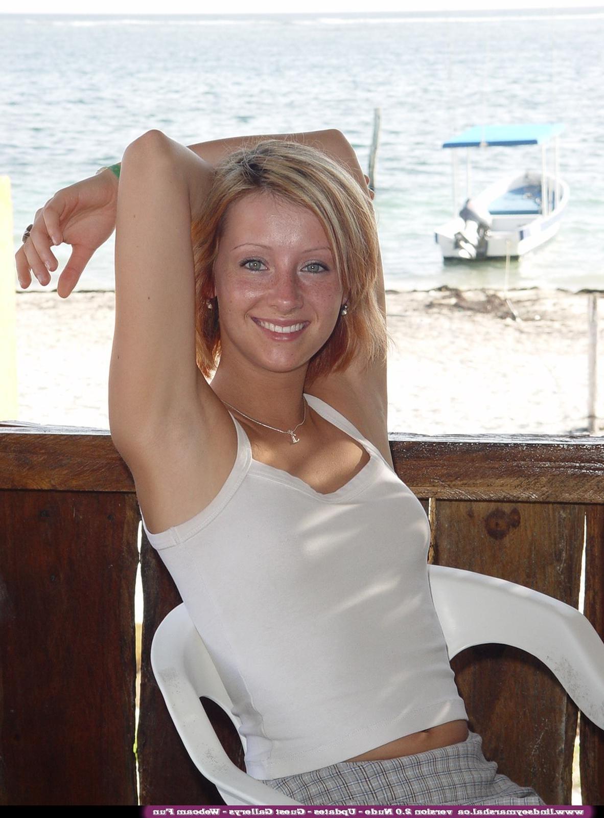 20P Pictures of teen redhead Lindsey Marshal getting nude for you