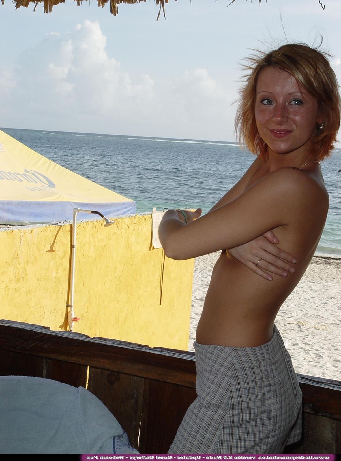 20P Pictures of teen redhead Lindsey Marshal getting nude for you