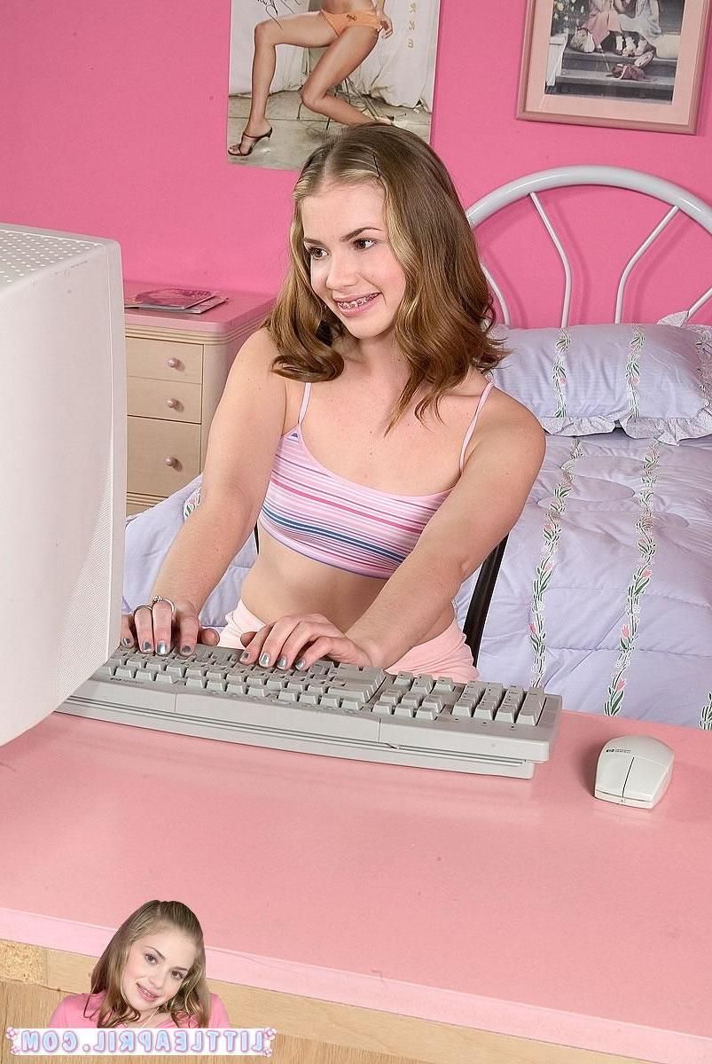 12P Pictures of Little April having some fun at her computer