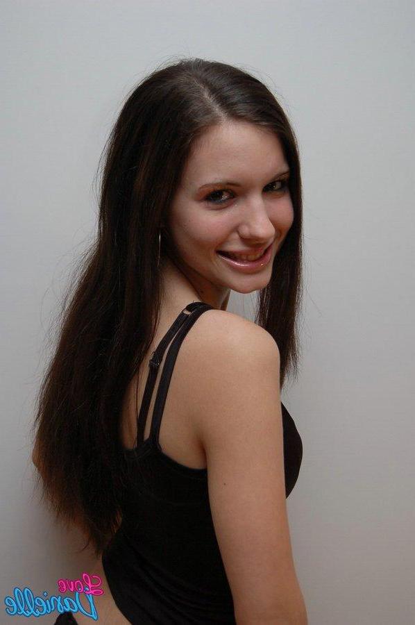 15P Pictures of teen model Love Danielle teasing with her top off
