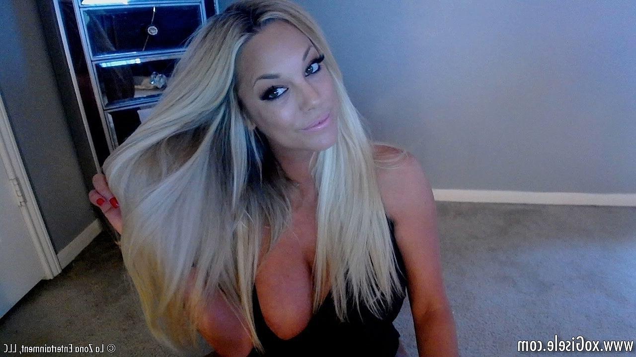 15P Gisele wears a tight mini skirt and low cut top as she strips everything off and gets down with her dildo