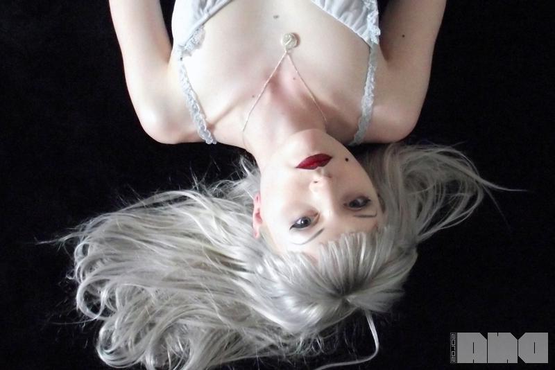 15P Beautiful alt girl Lovisa Grey looks up at you while she strips