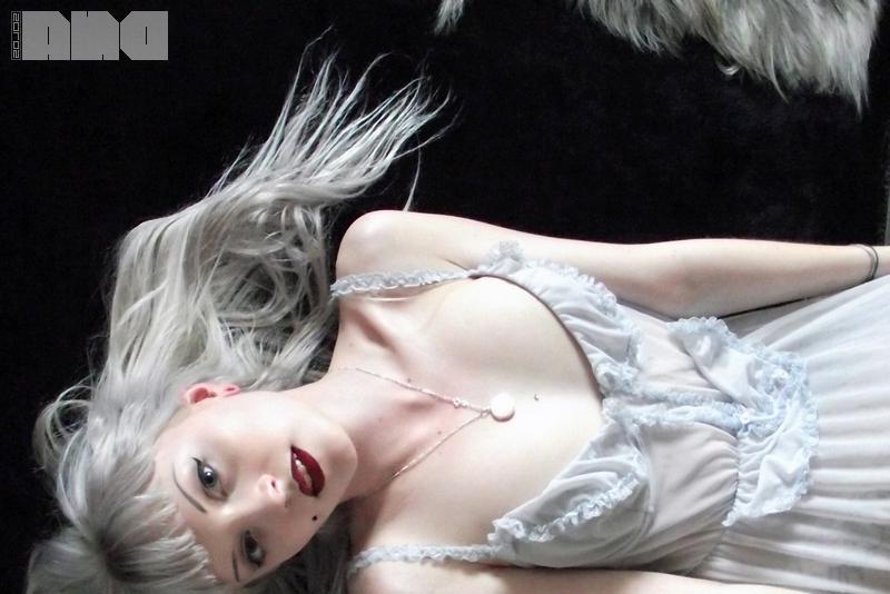 15P Beautiful alt girl Lovisa Grey looks up at you while she strips