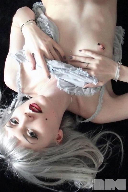 15P Beautiful alt girl Lovisa Grey looks up at you while she strips