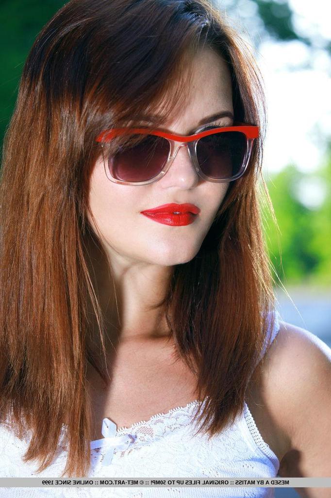 18P Redhead beauty Mesed A stops in the middle of the street to strip naked