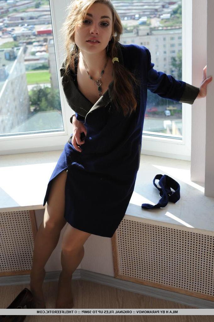 16P Playful and youthful Mila H strips out of her dress for you by the window