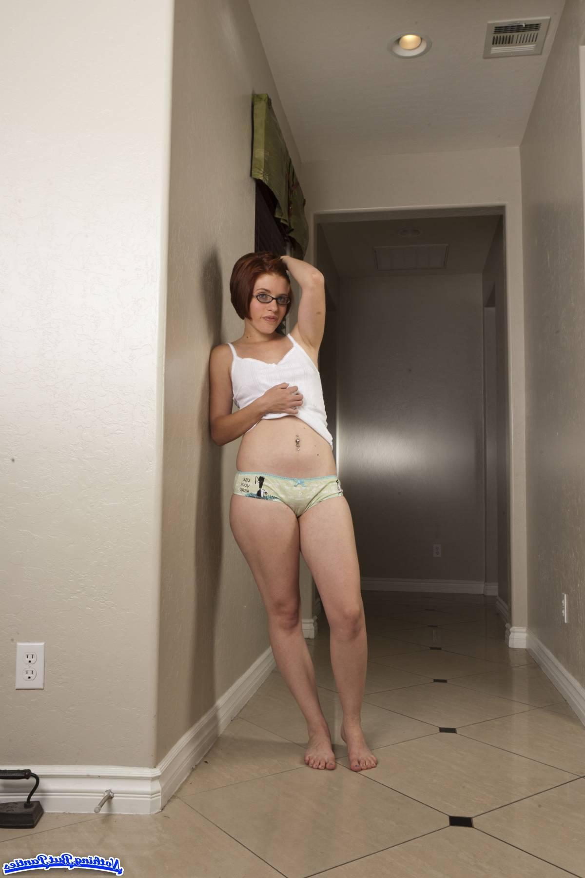 18P Pictures of redhead girl Molly teasing in boyshorts and glasses