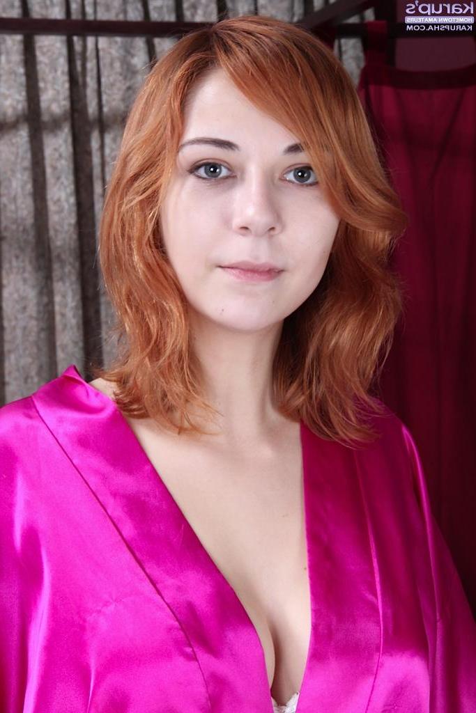 15P Redhead teen Nancy Reid toys her pussy in her bedroom