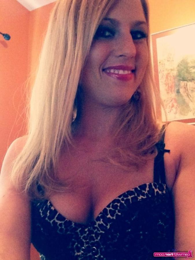12P Blonde babe Natasha Adams does a cam show in leopard print lingerie