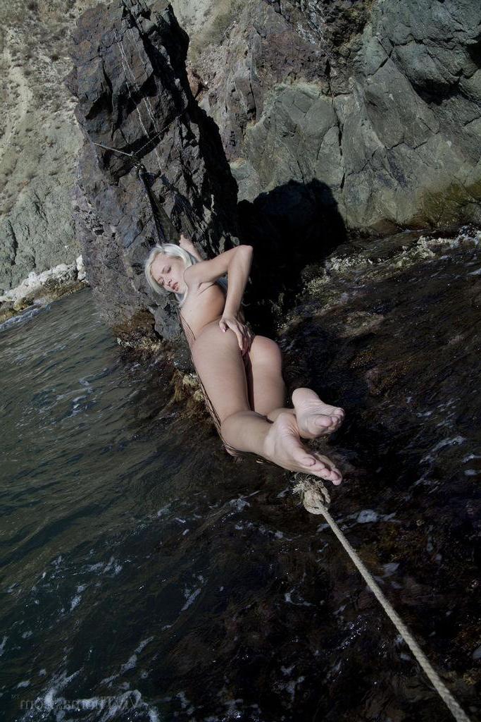 16P Blonde teen Nika N goes for a nude swim in "Siren"