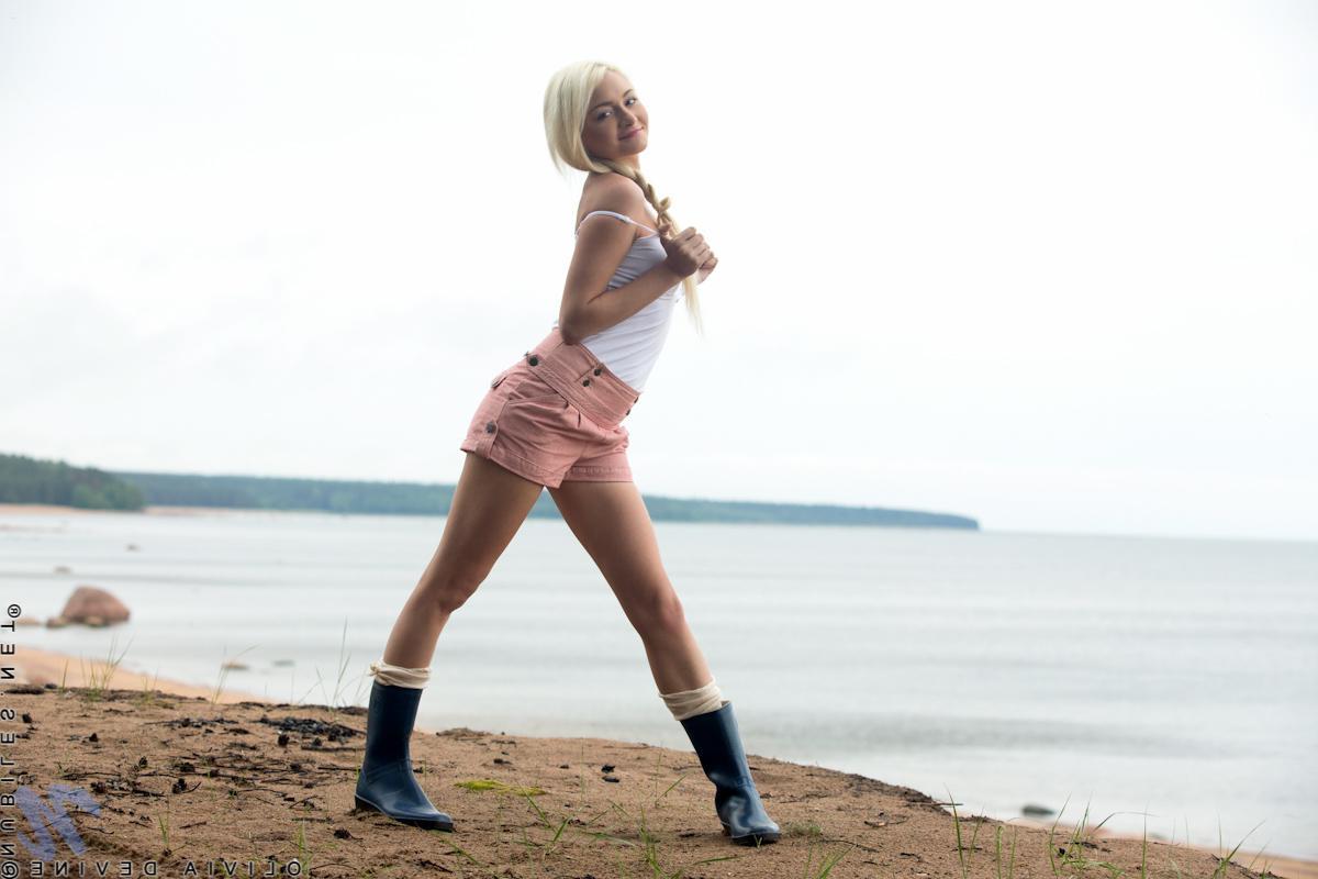 15P Gorgeous blonde babe Olivia Devine gets naughty and naked on a beach