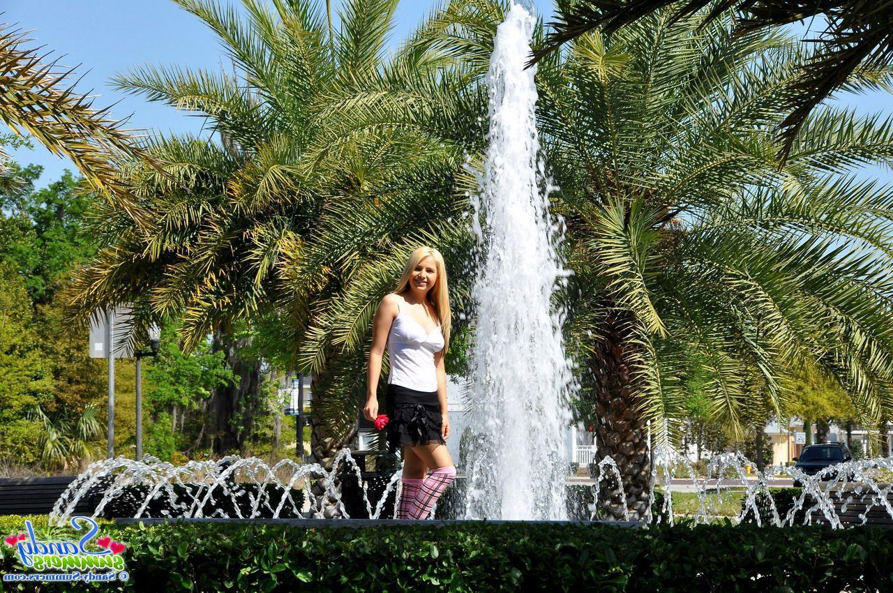 20P Pictures of Sandy Summers showing up her skirt in a park