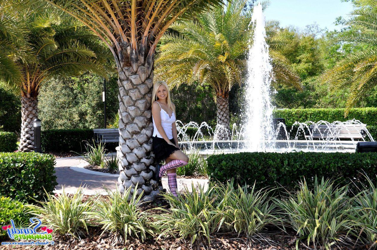20P Pictures of Sandy Summers showing up her skirt in a park