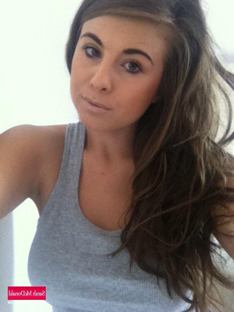 12P Sexy Sarah is at home in her grey top and denim shorts, but not for long