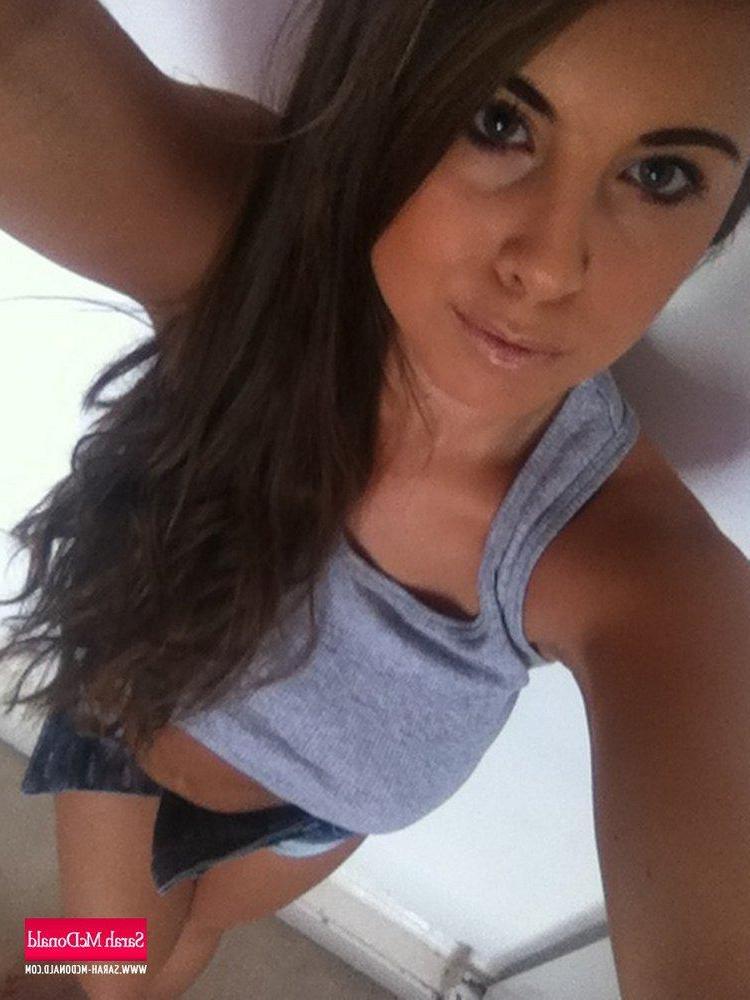 12P Sexy Sarah is at home in her grey top and denim shorts, but not for long