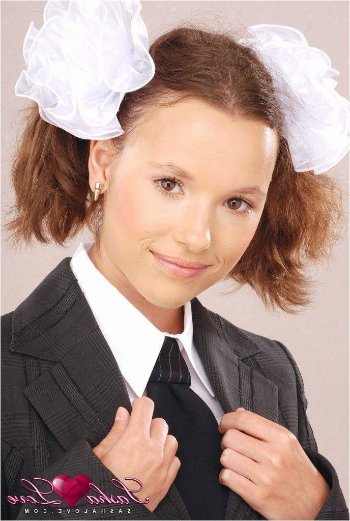 14P Pictures of teen Sasha Love dressed as a catholic schoolgirl