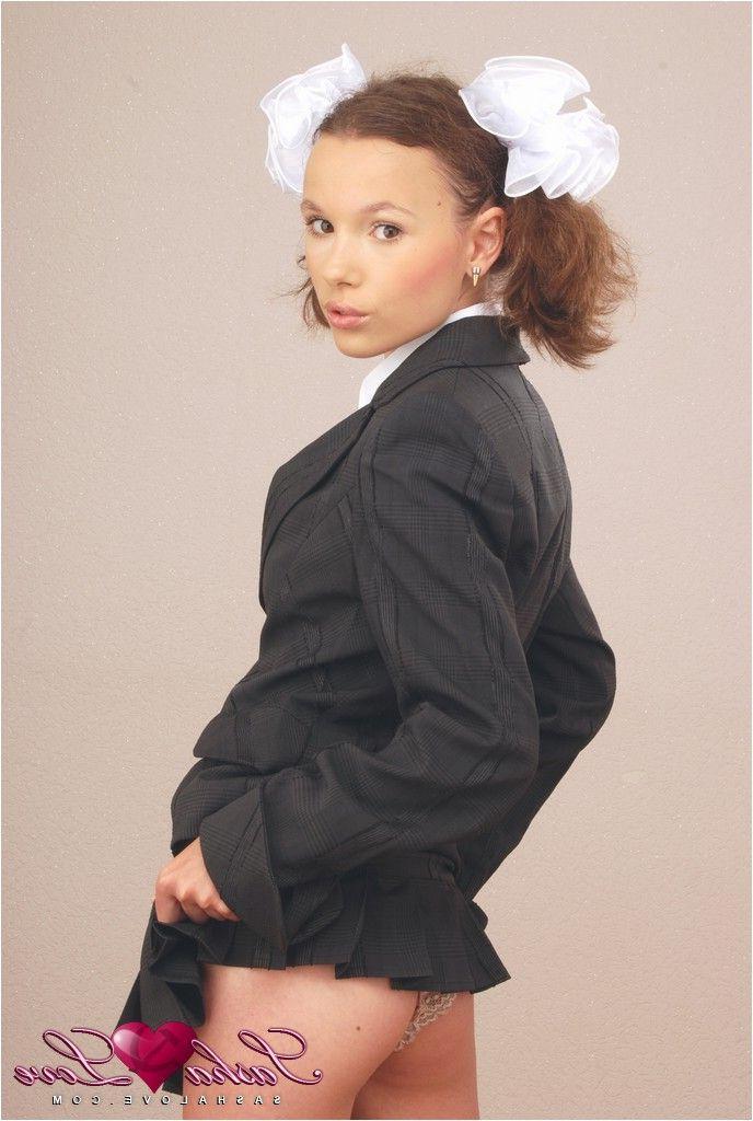 14P Pictures of teen Sasha Love dressed as a catholic schoolgirl