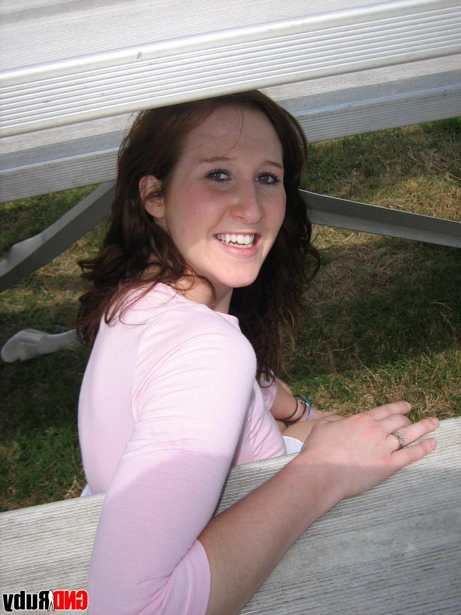 12P Super cute redhead teen Ruby teases on the park bleachers showing off her tight white panties