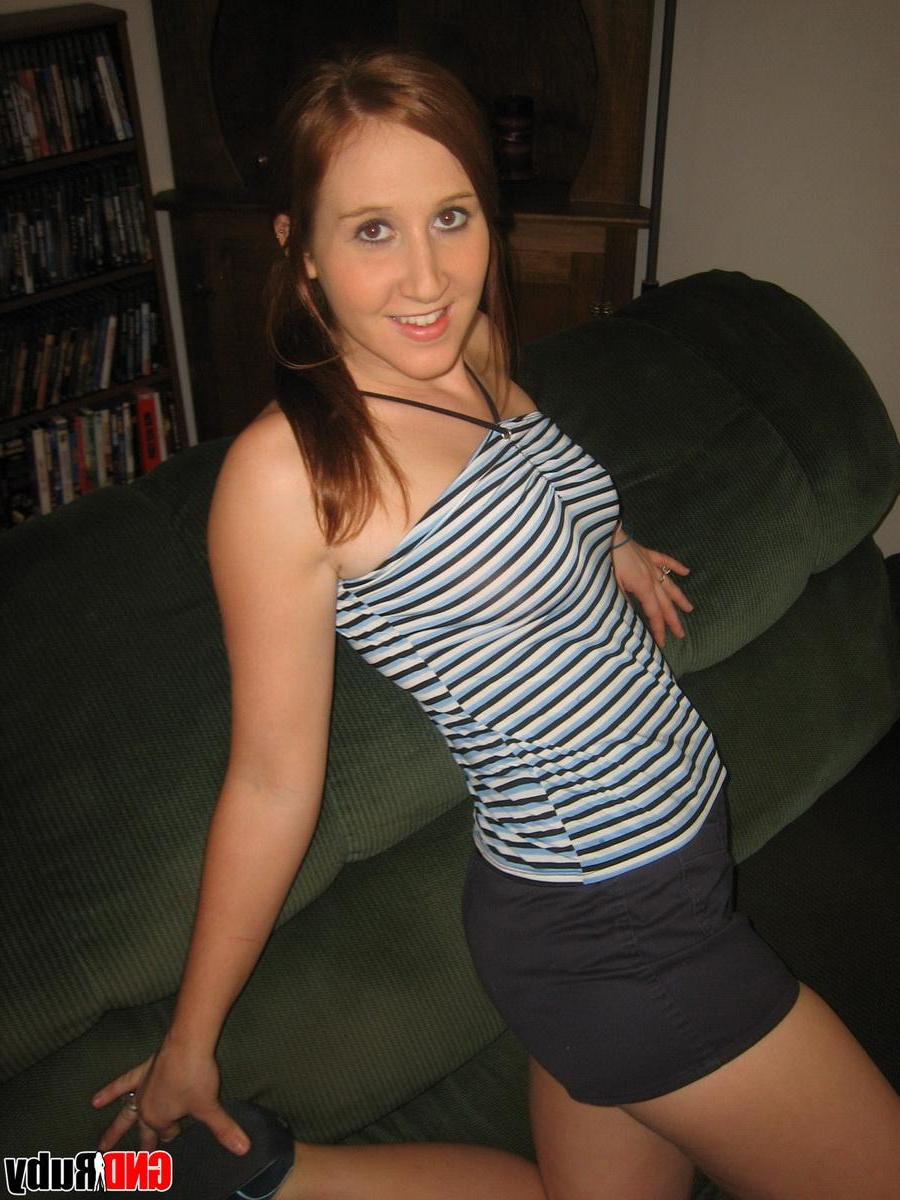 12P Horny redhead Ruby strips out of her Superman panties and starts to finger her wet pussy