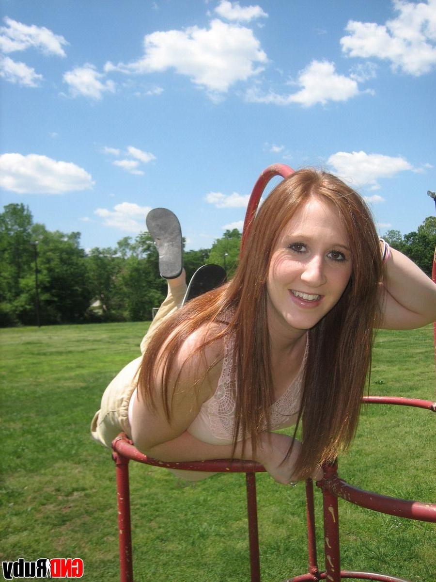 12P Cute ginger teen Ruby flashes her perky tits at the park while playing on the jungle gym