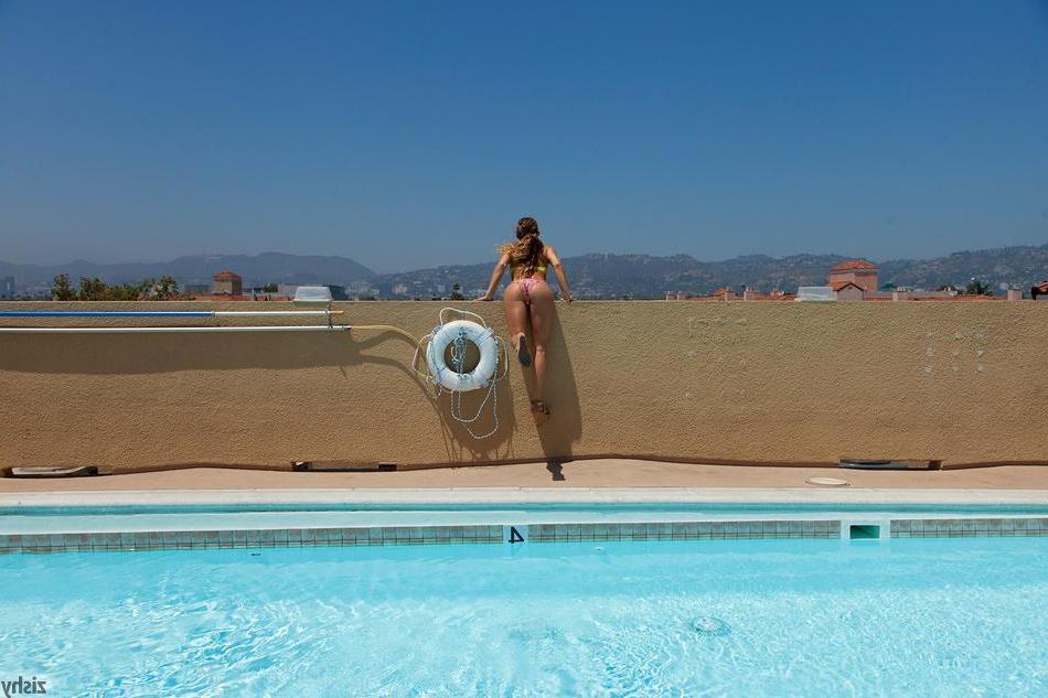 8P Busty coed Serina Cardoni teases in her bikini by the pool