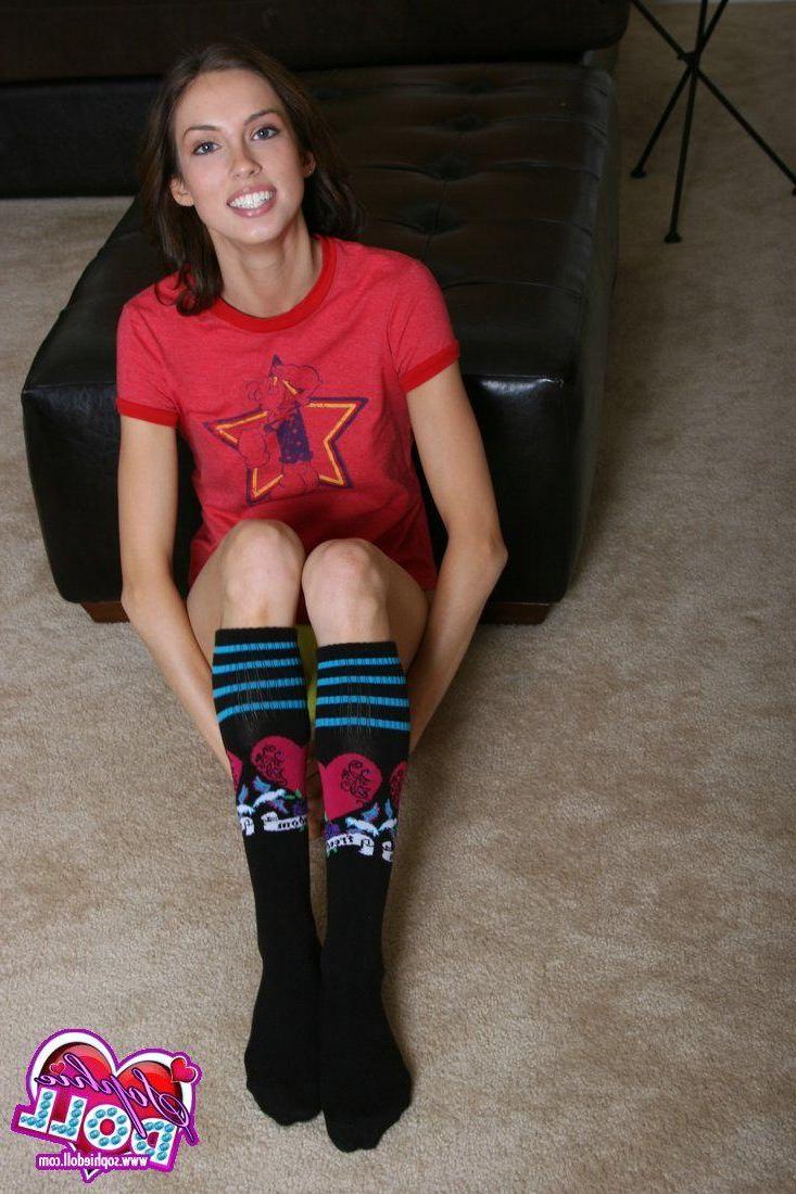 16P Pictures of teen babe Sophie Doll showing her perky teen titties