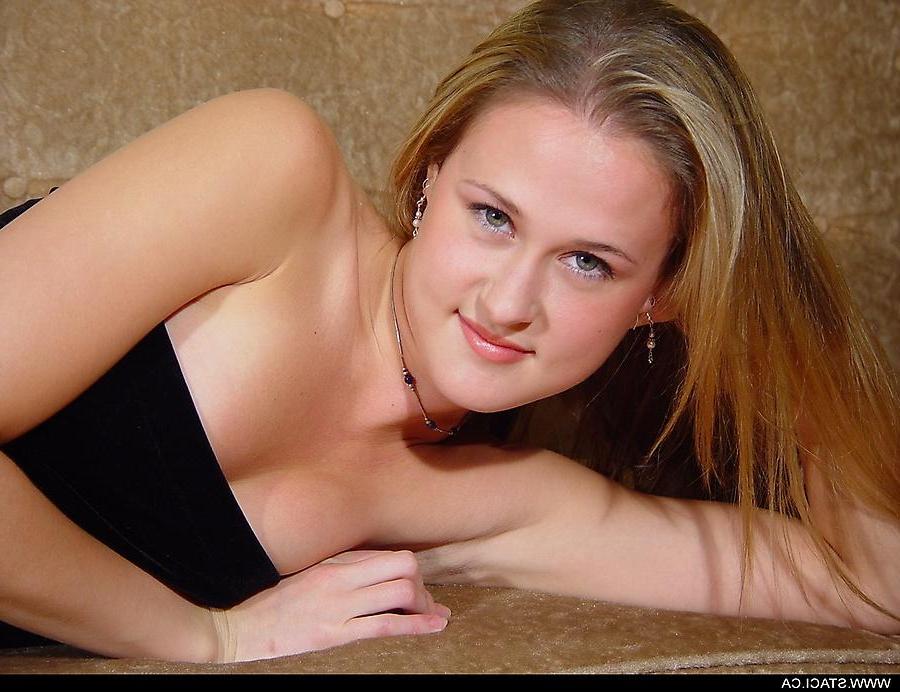 20P Pictures of Staci.ca getting topless on the couch