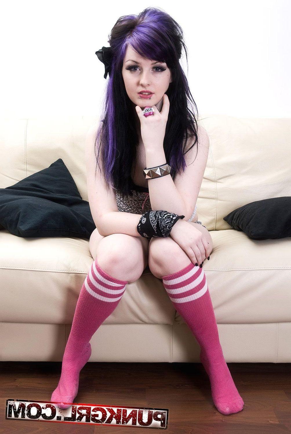 20P Pictures of Tasha Riot stripping on the couch