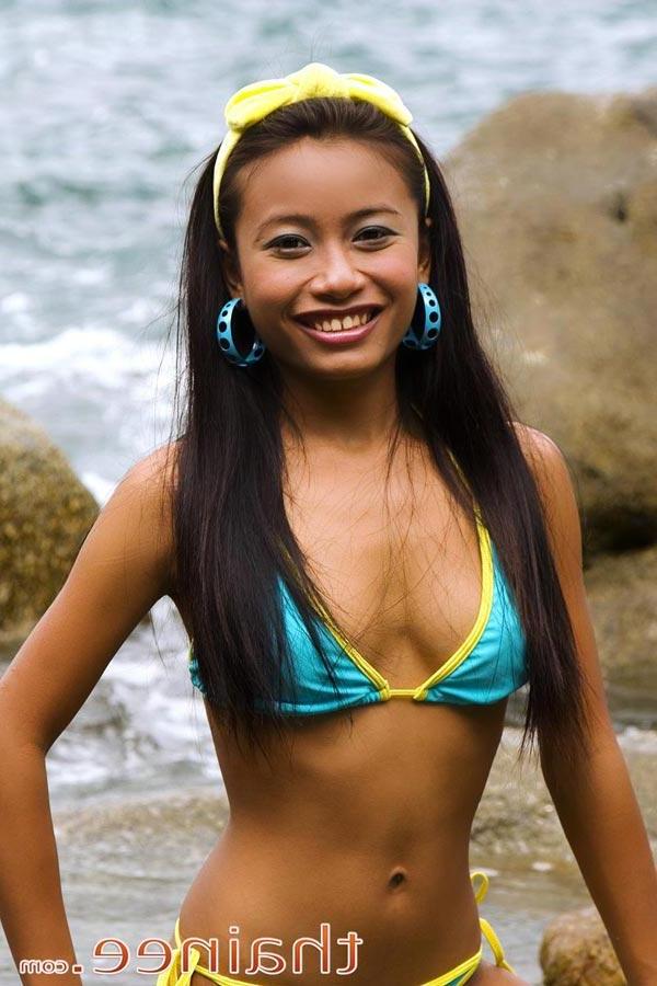 16P Pictures of teen babe Thainee flashing from behind her bikini