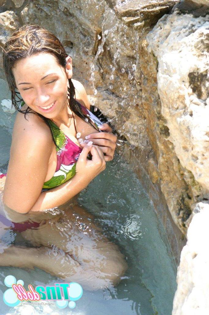 15P Tina Doll goes swimming topless