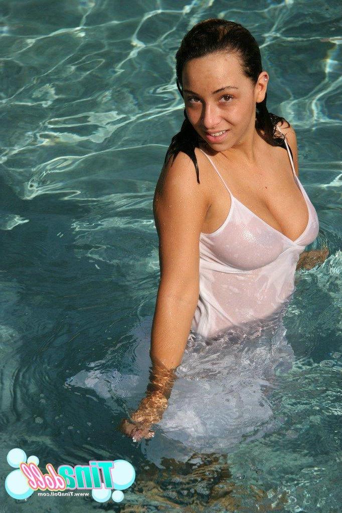 15P Tina Doll gets completely naked and goes swimming