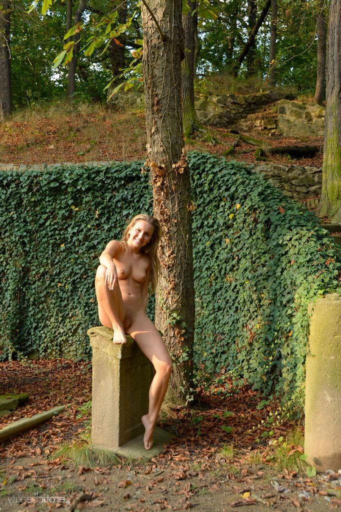 16P Pretty blonde teen Ness displays her hot naked body outside