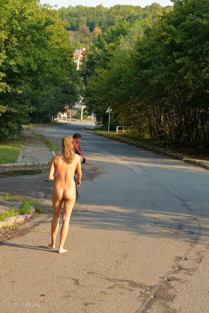 16P Pretty blonde teen Ness displays her hot naked body outside