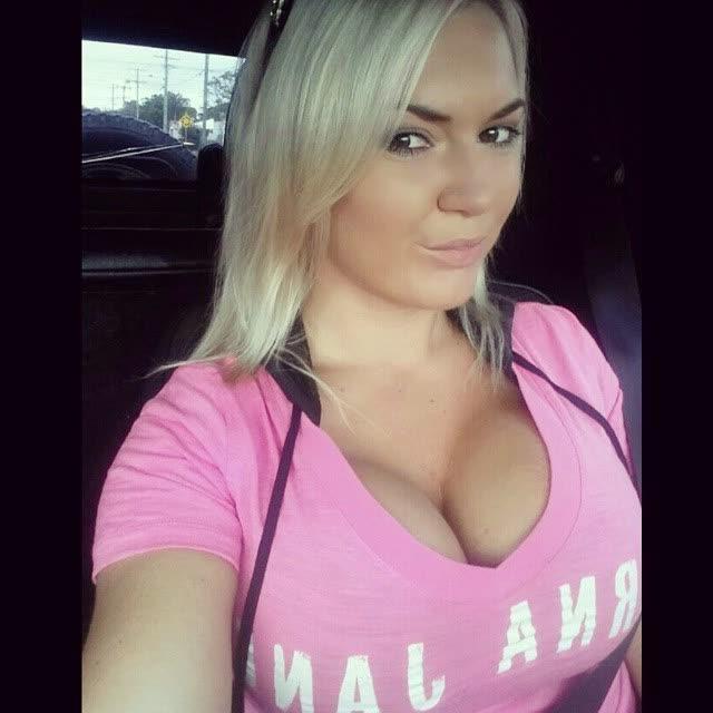 14P Heavy-chested blonde bombshell spilling out of her top