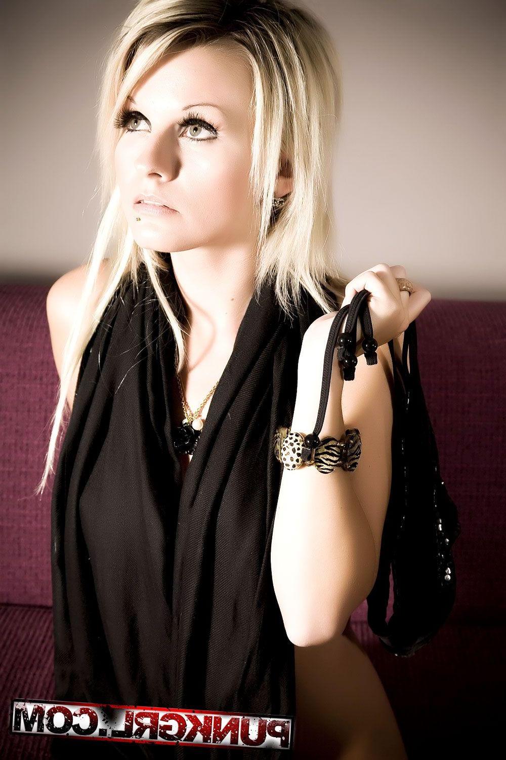 15P Pictures of blonde teen Janneke teasing on the couch