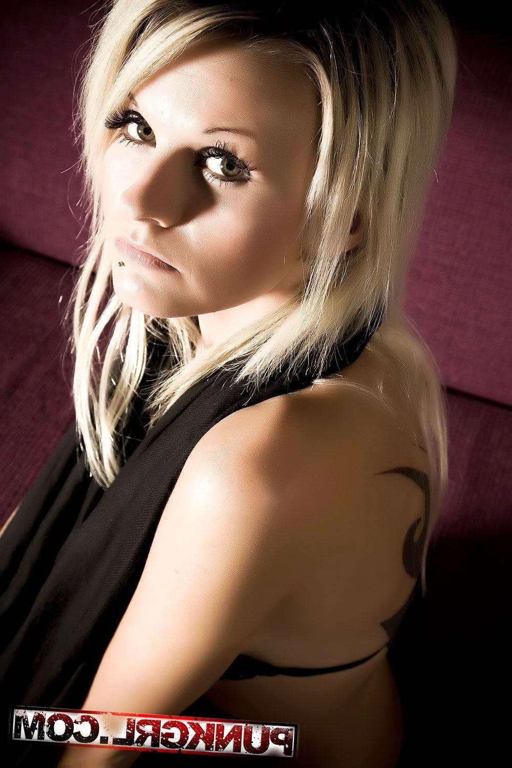 15P Pictures of blonde teen Janneke teasing on the couch