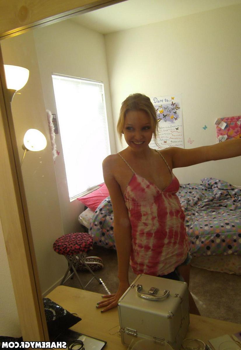 20P Pictures of a hot blonde GF taking pics of her sexy boobs