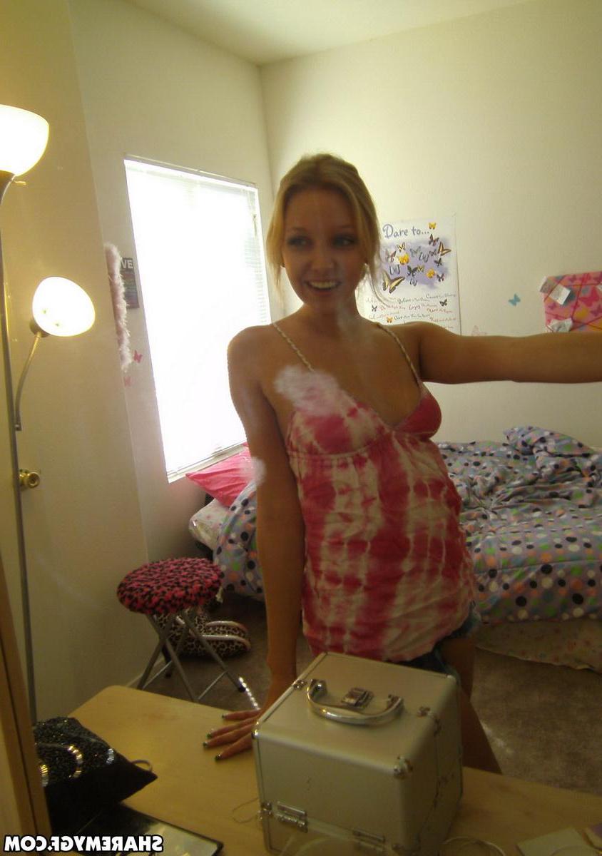 20P Pictures of a hot blonde GF taking pics of her sexy boobs