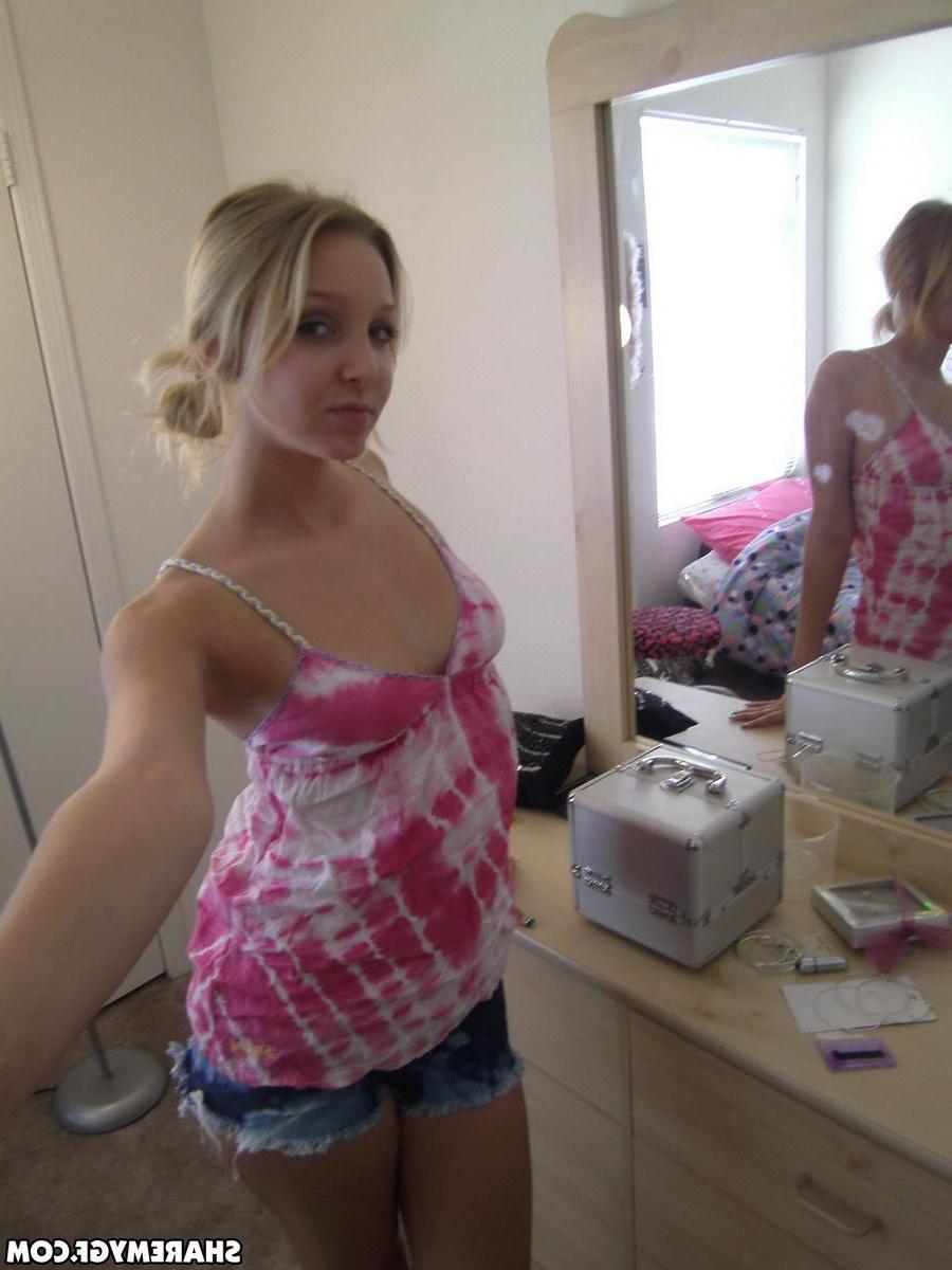 20P Pictures of a hot blonde GF taking pics of her sexy boobs