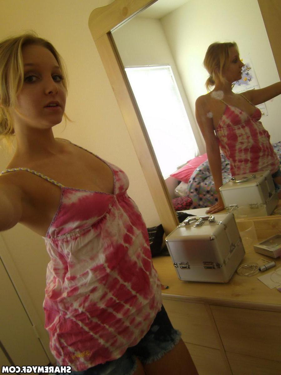20P Pictures of a hot blonde GF taking pics of her sexy boobs