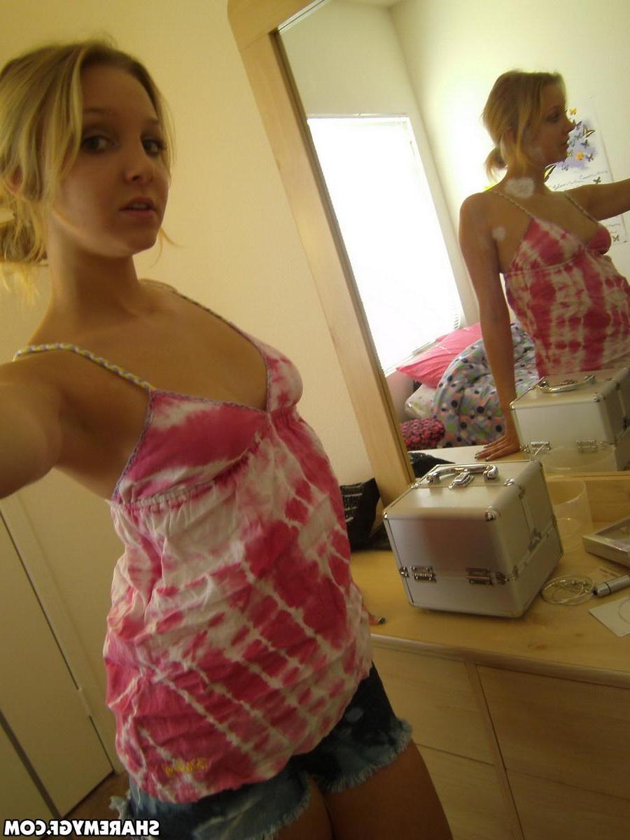 20P Pictures of a hot blonde GF taking pics of her sexy boobs