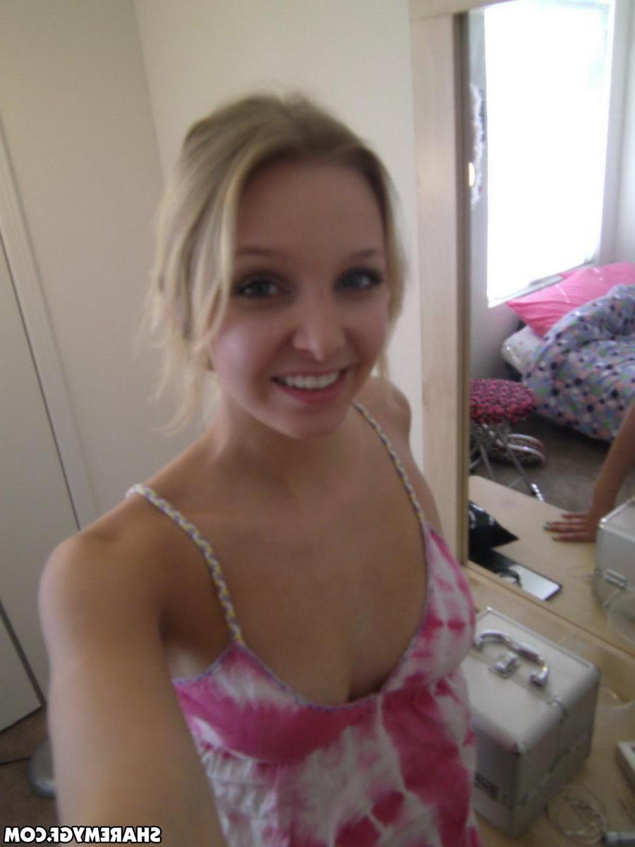 20P Pictures of a hot blonde GF taking pics of her sexy boobs
