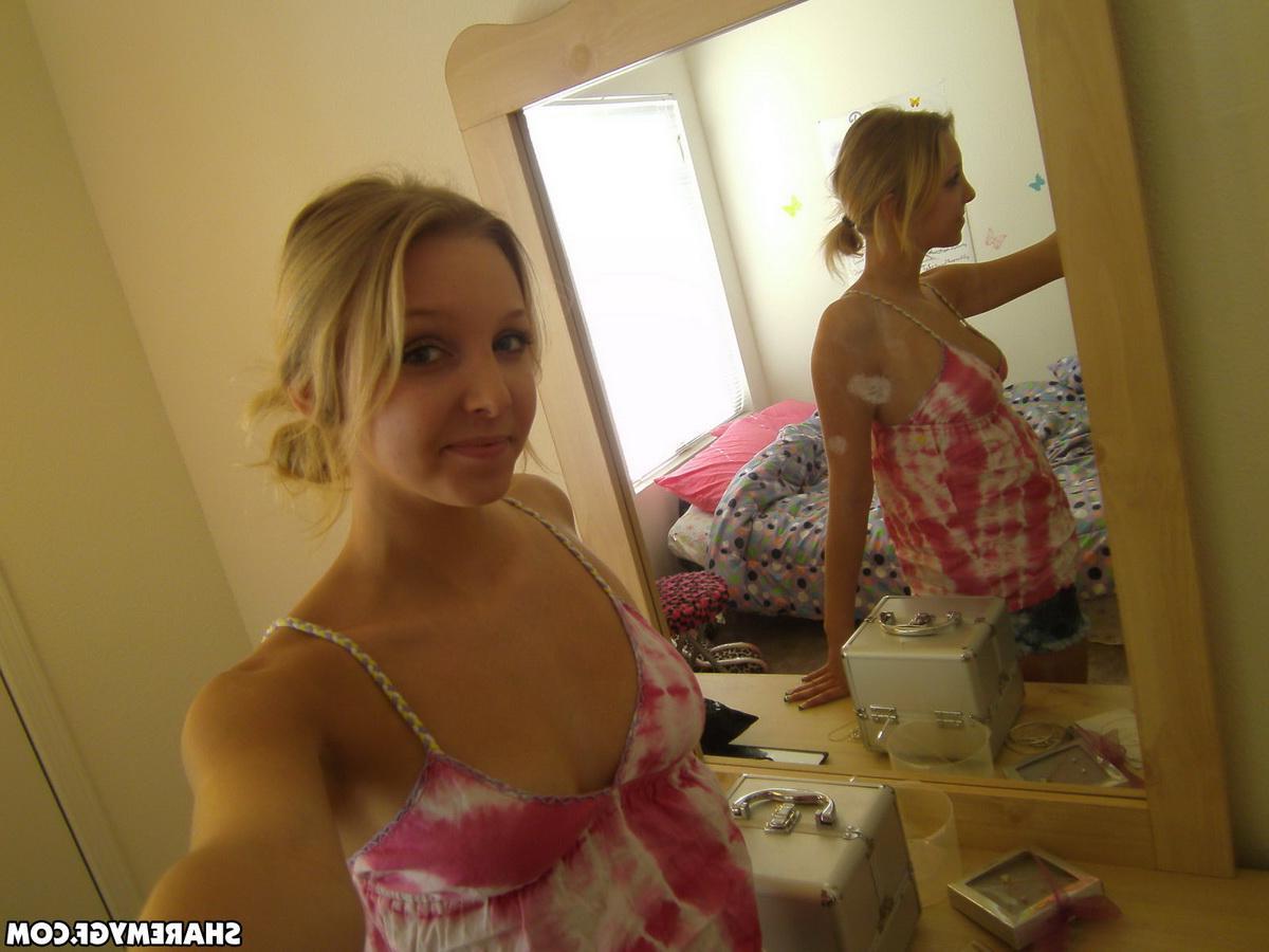 20P Pictures of a hot blonde GF taking pics of her sexy boobs