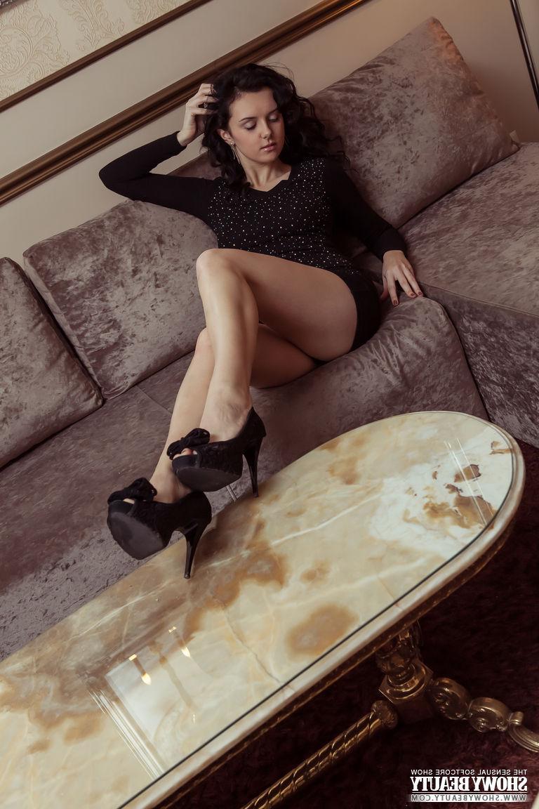 20P Stunning girl Arina strips nude for you in Sensations